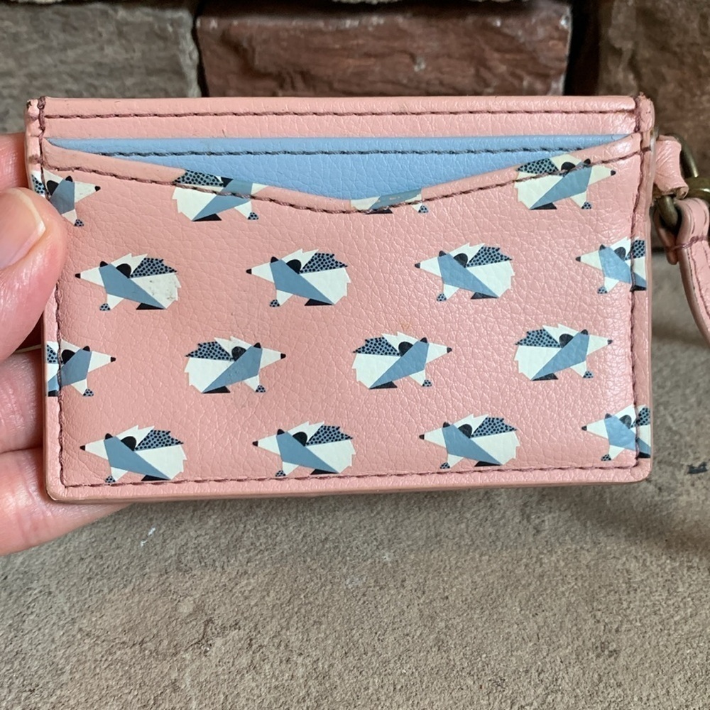 Fossil pink and blue card holder wristlet with hedgehog design - Picture 2 of 6